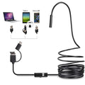 USB-C endoscope with camera head, flexible cable, and hook, magnet, and mirror attachments on a table.