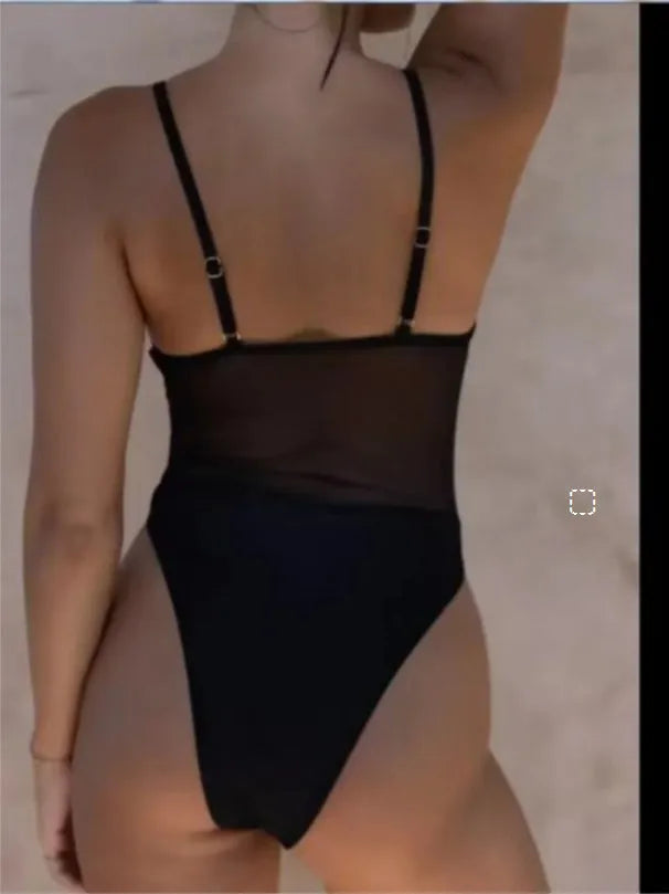 Women's black quick-dry polyester one-piece swimsuit in banded bikini style on mannequin