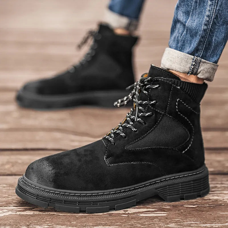 Men's frosted leather vintage Martin boots with thick rubber sole in black, shown on foot.