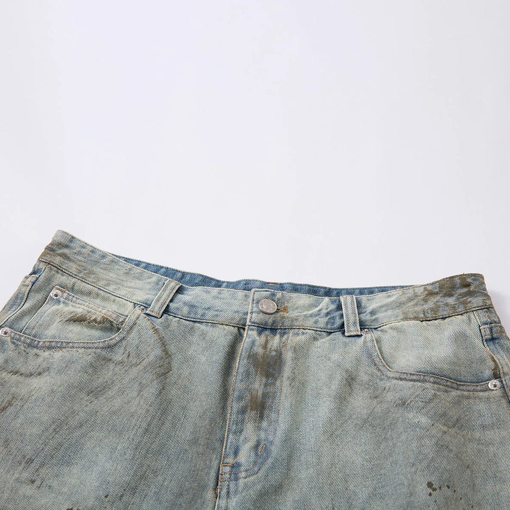 Blue cropped denim middle pants with straight leg design and zipper fly opening on hanger