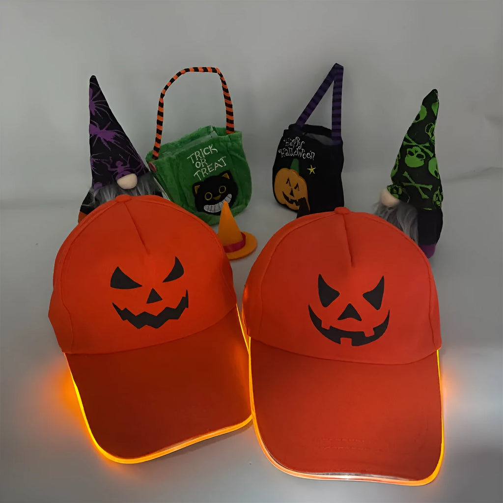 Halloween LED baseball cap with glowing coloured lights on a black cloth background.