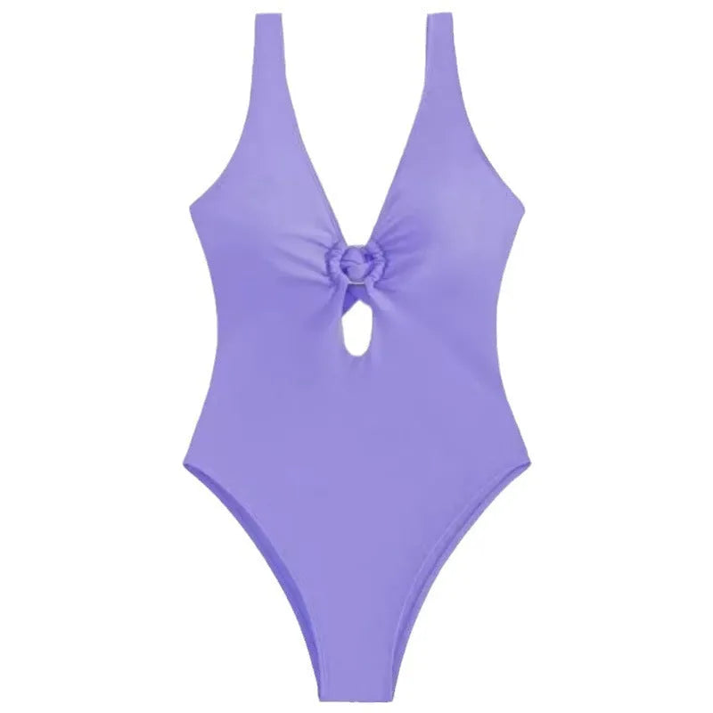Women's solid colour one-piece polyester swimsuit shown in multiple colour options