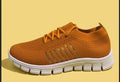 Women's breathable sneakers in multiple colours with rubber soles and lace-up front