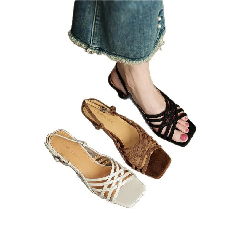 Retro women's sandals with thin brown cross straps, square toe, adjustable ankle buckle, and a block heel.