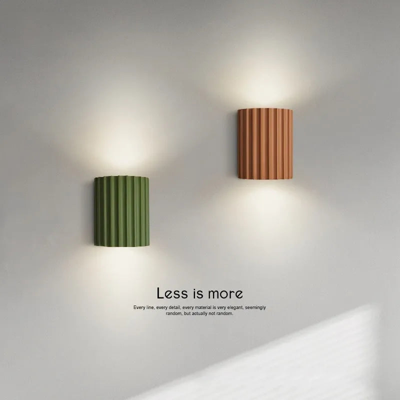 Nordic macaron-shaped wall light for hallways in a choice of five colours.