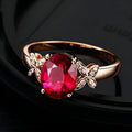 Women's copper butterfly and heart shape ring with 18k rose gold plating in red and blue colour options.