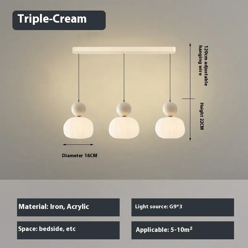 Creative alloy pumpkin chandelier light fixture for ceiling mounting in cream, red, green, chrome, or walnut finish.