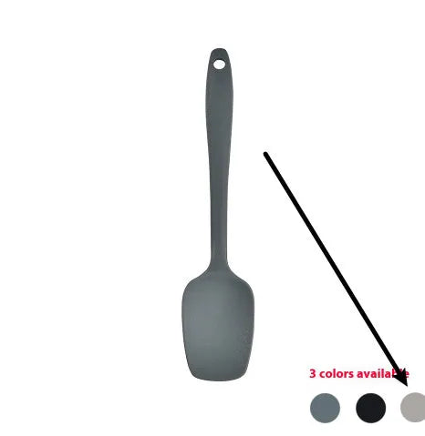 Black silicone kitchen utensil set with 12 tools in a rotating storage bucket on a kitchen countertop
