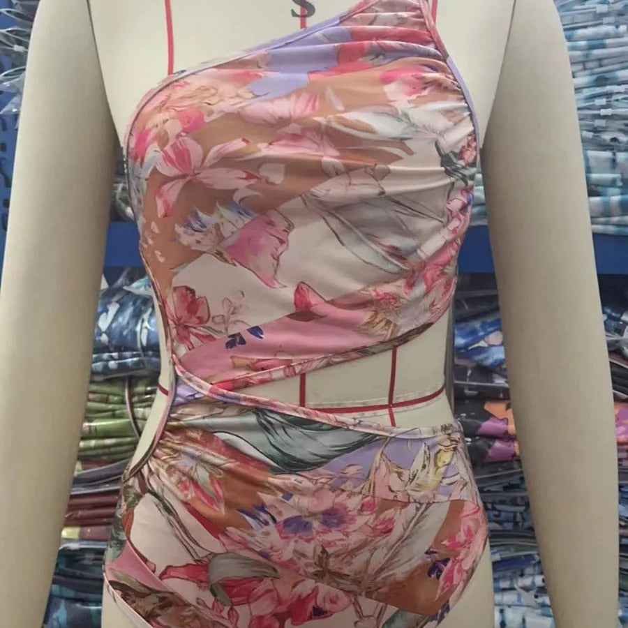 Rose gold patterned women's swimsuit in polyester fabric on mannequin