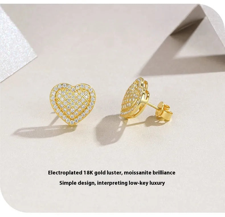 Pair of golden heart-shaped moissanite stud earrings on S925 sterling silver posts