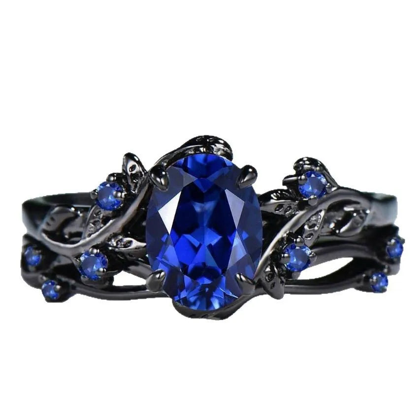 Gun black women's couple ring with navy blue rhinestone inlay on geometric copper band