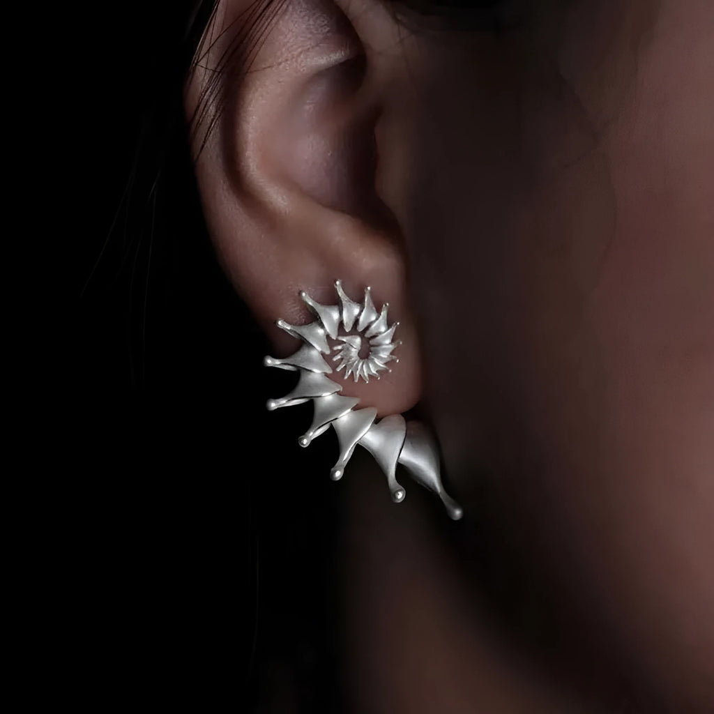 Three-dimensional matte conch stud earrings in alloy with irregular shape