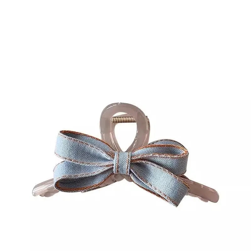 Blue denim bow barrette with cloth bow and metal clip on women back head hair
