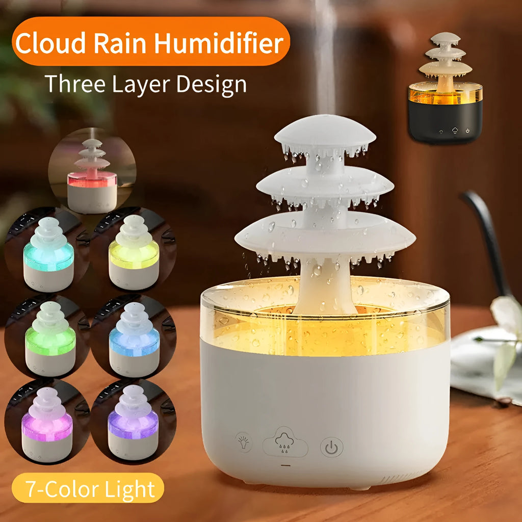 White Cloud Rain air humidifier and essential oil diffuser with colourful LED light on a table.