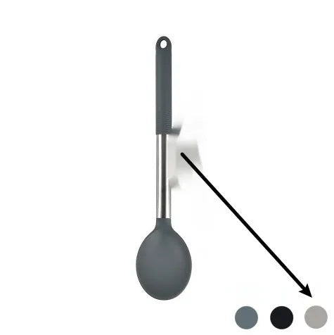 Black silicone kitchen utensil set with 12 tools in a rotating storage bucket on a kitchen countertop