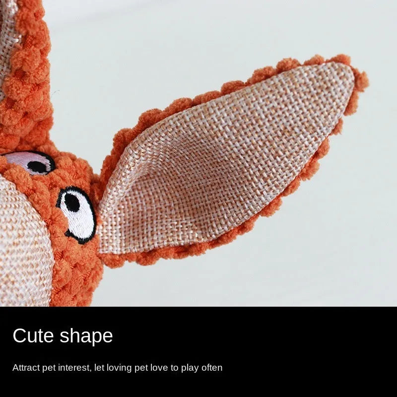 Small plush dog chew toy in animal shape with squeaker for interactive play and teeth cleaning