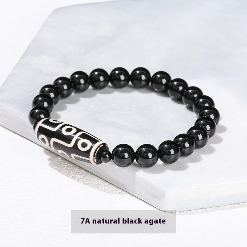 Handmade barrel shaped Dzi bead bracelet in green with geometry design