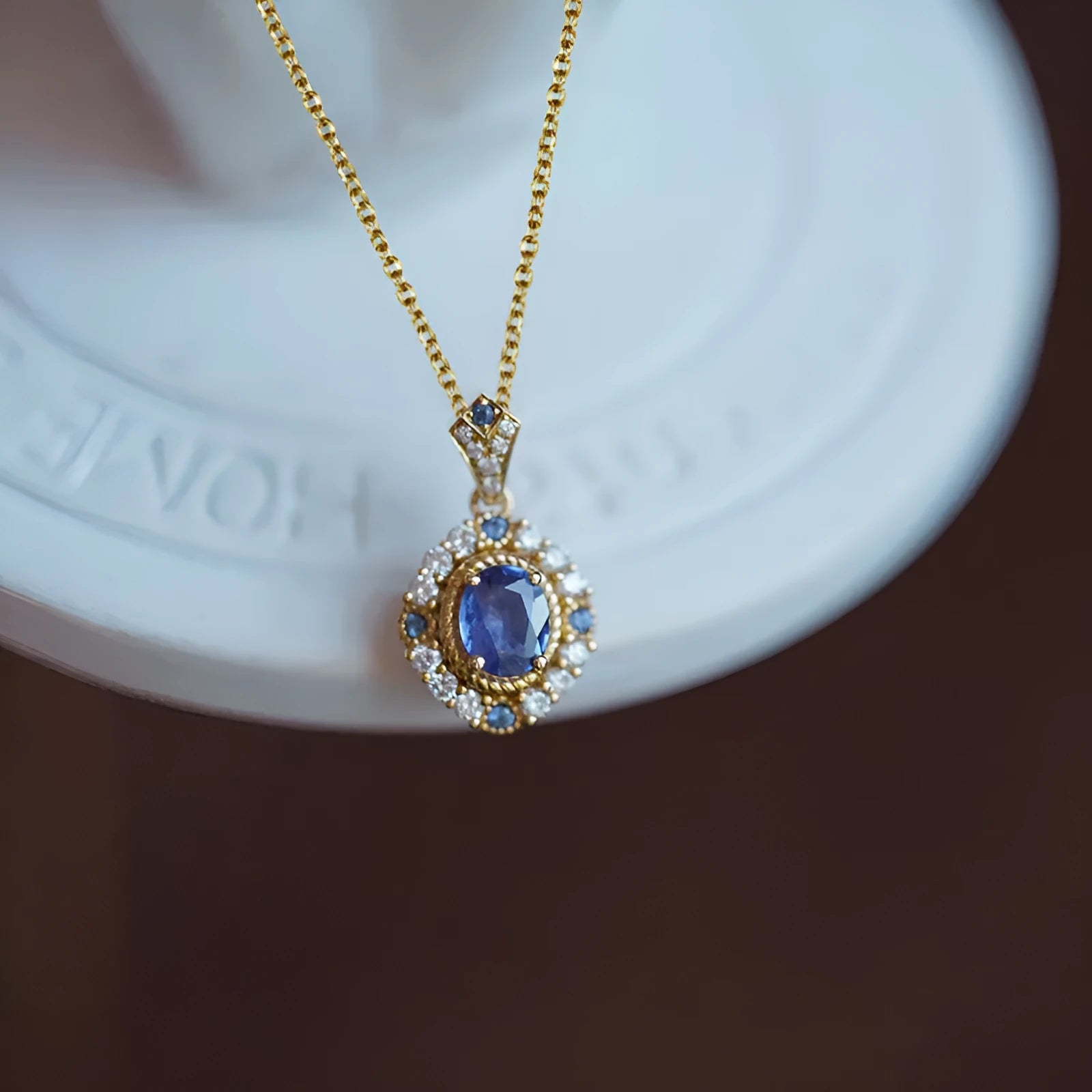Huitan women's adjustable gold necklace with mixed gem and zircon pendant on a box chain, shown at various lengths.