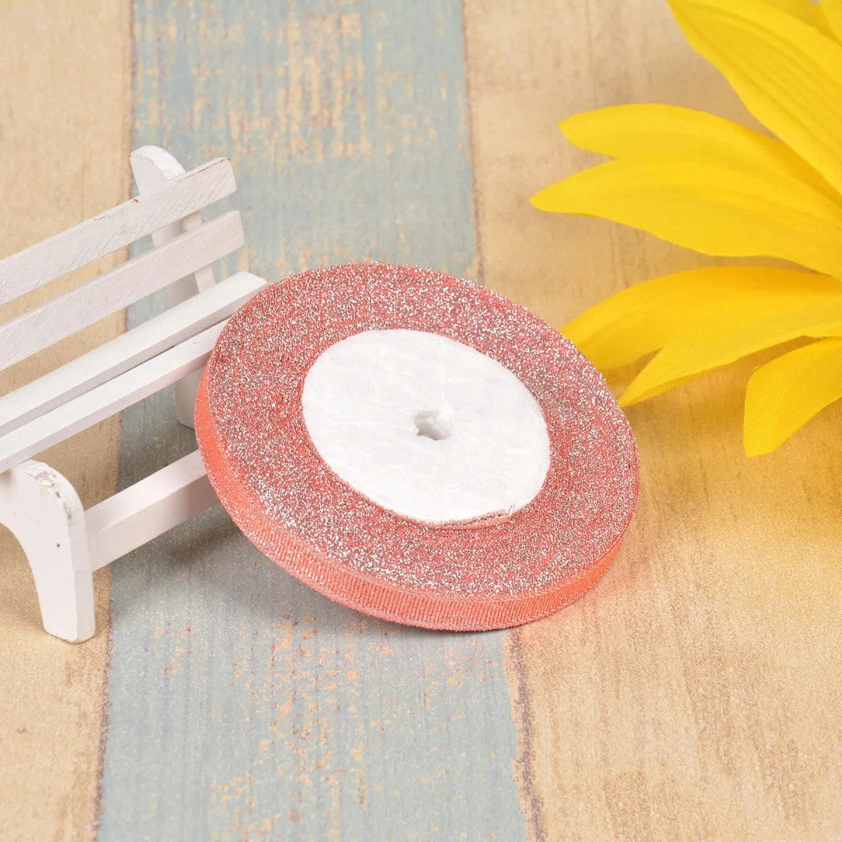 Colourful green onion pattern polyester ribbon spool with metallic gold or silver wire detailing.