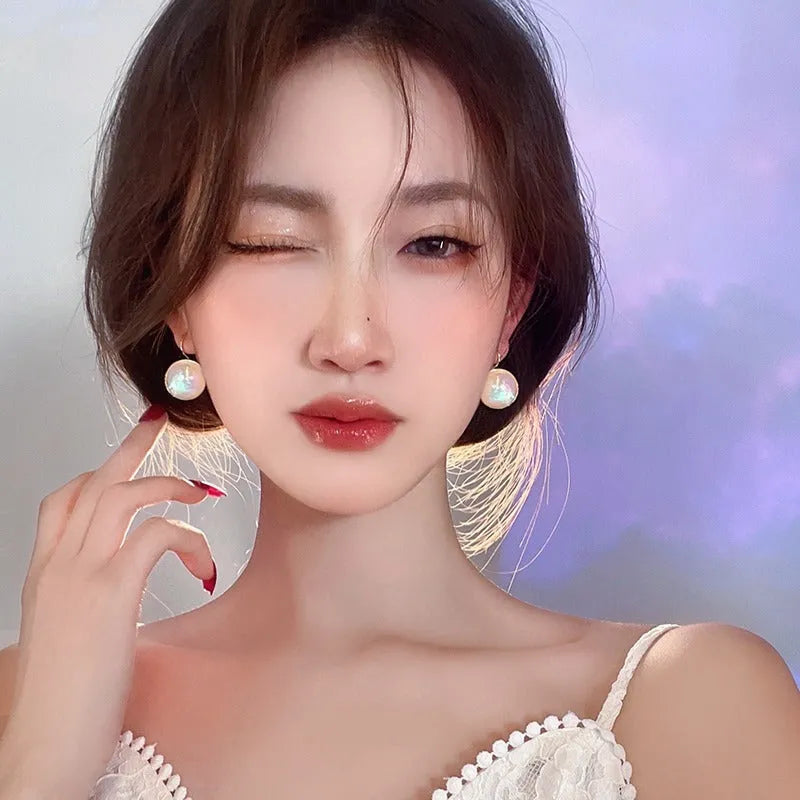 Colourful geometric Korean style metal clip-on earrings with mermaid pearl design and anti-lost clip.