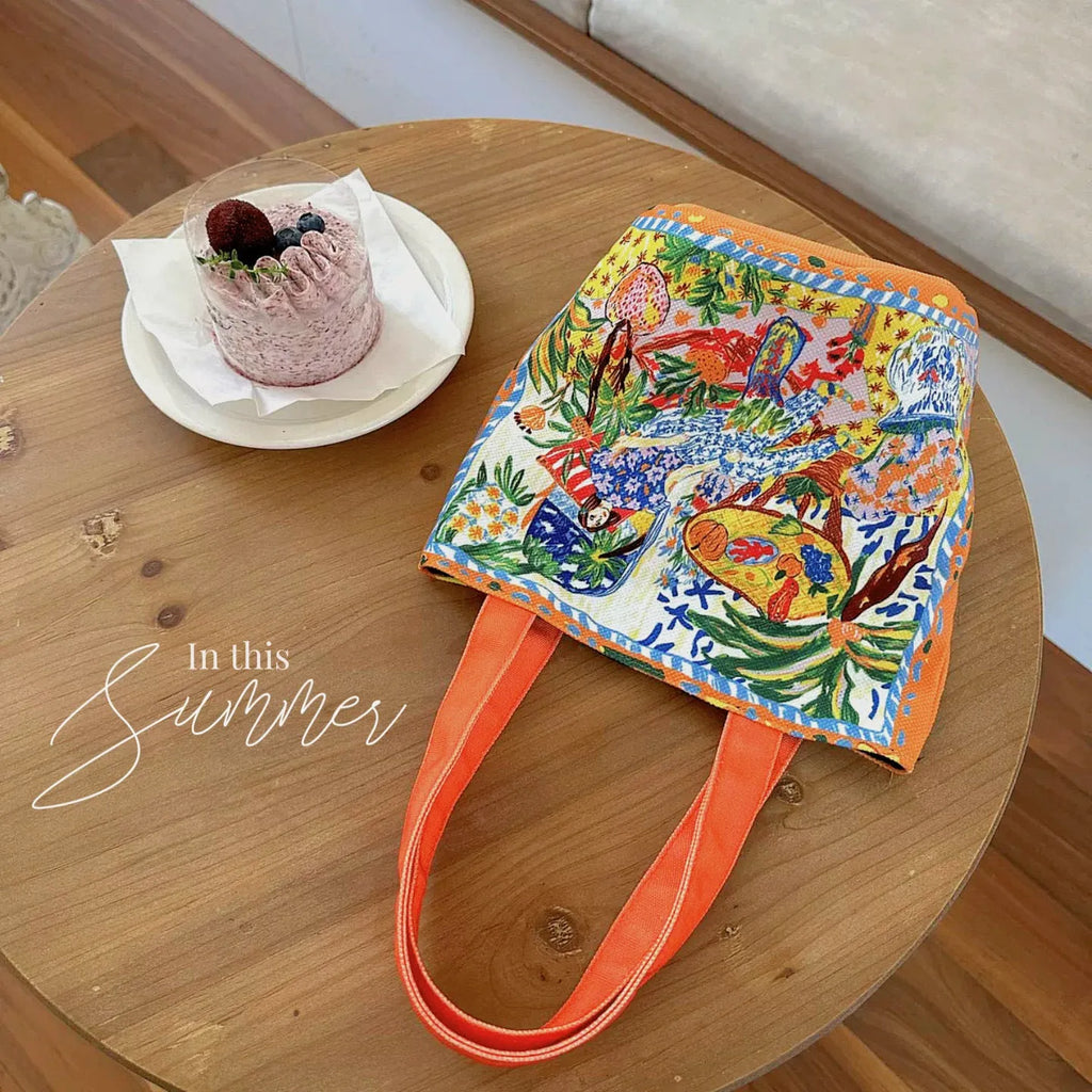 Dream Garden orange plush canvas women's bucket bag with double shoulder straps and printed letter details