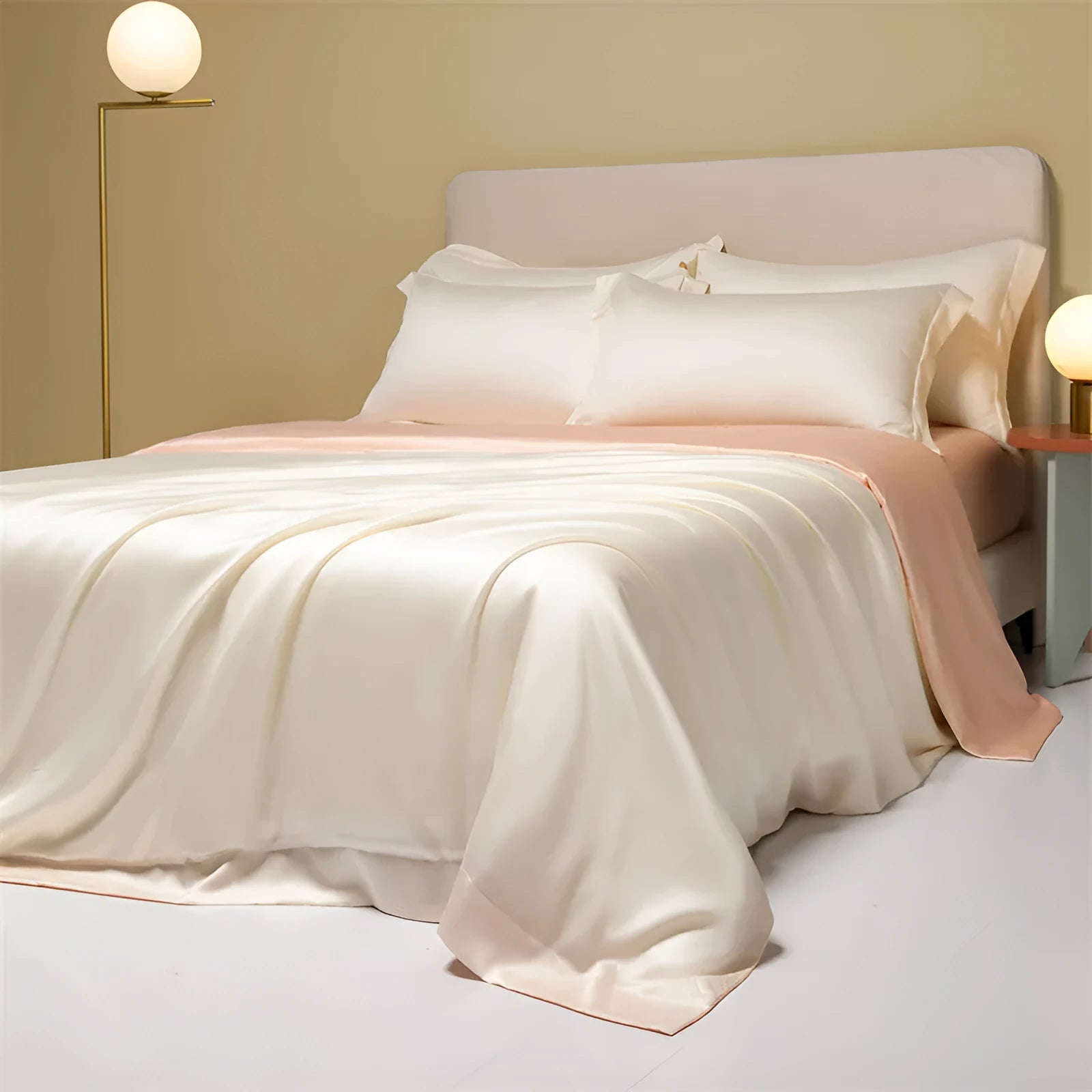 Aurora Blue 200 thread count Tencel duvet cover, fitted sheet, and pillowcases laid on a modern bed.