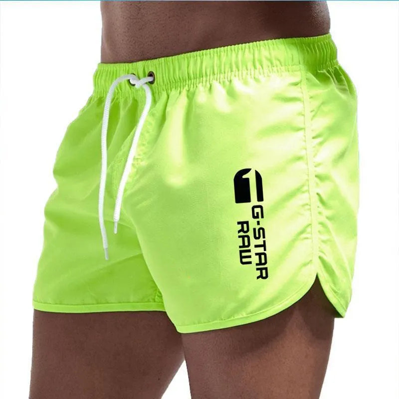 Men's polyester beach shorts with elastic waistband in multiple colour options