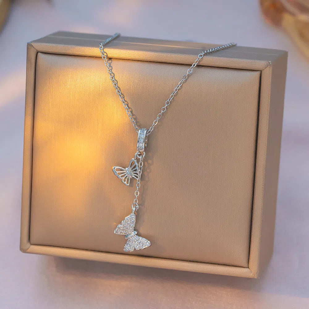Japanese Korean style light luxury full rhinestone tassel butterfly micro-inlaid necklace on display