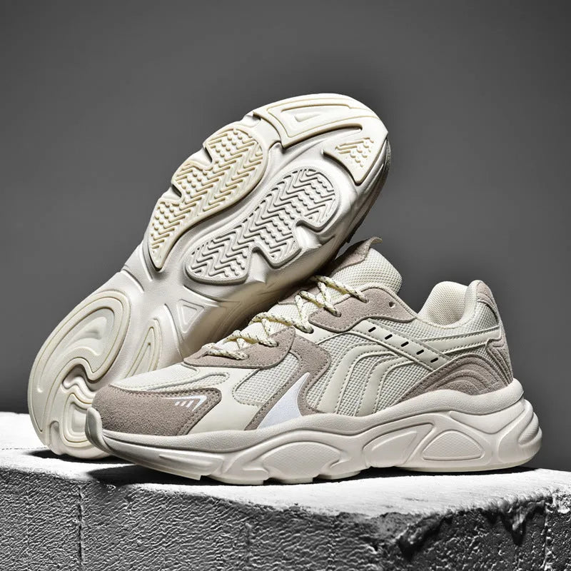 Men's collapsible casual sneakers in black and beige colours showing flat storage position