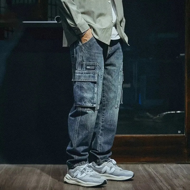 Men's loose straight blue denim trousers with stretch fabric and zip fly in retro style