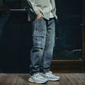 Men's loose straight blue denim trousers with stretch fabric and zip fly in retro style