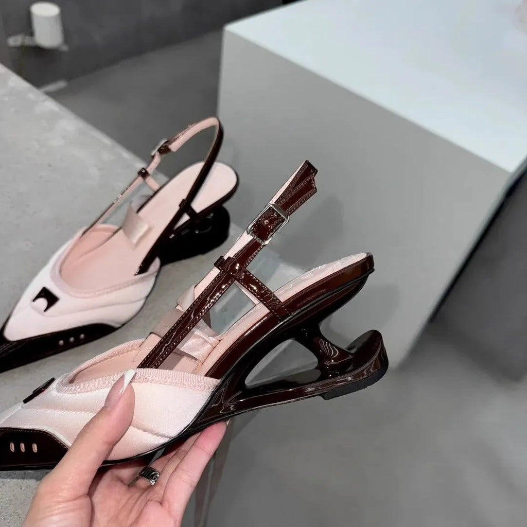 Women's special-shaped lace-up high heels in black and pink with a cowhide upper.