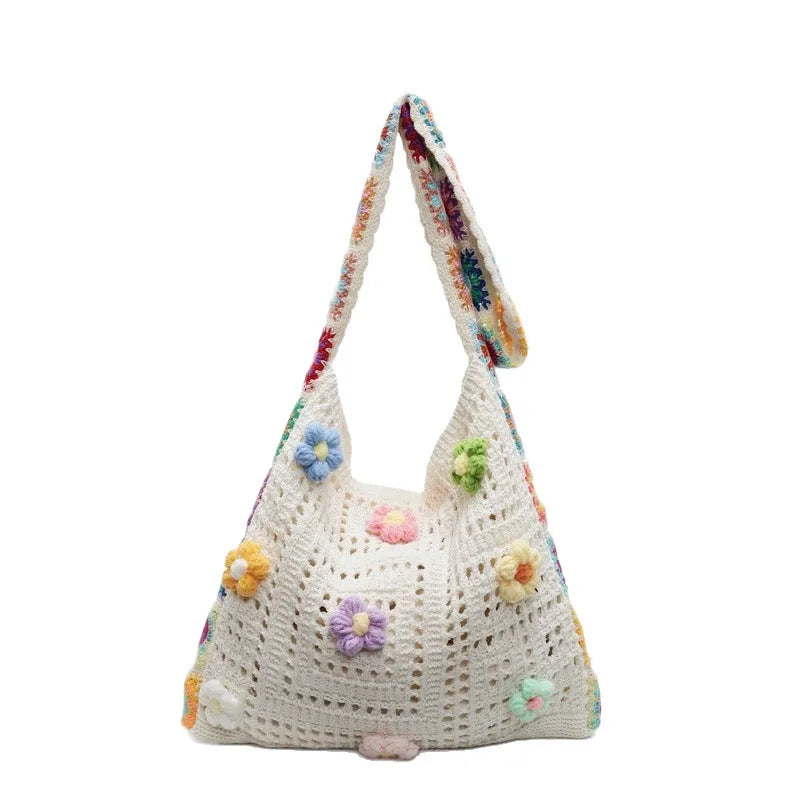 Women's woven hollow knit beach shoulder bag in milky white colour with single strap