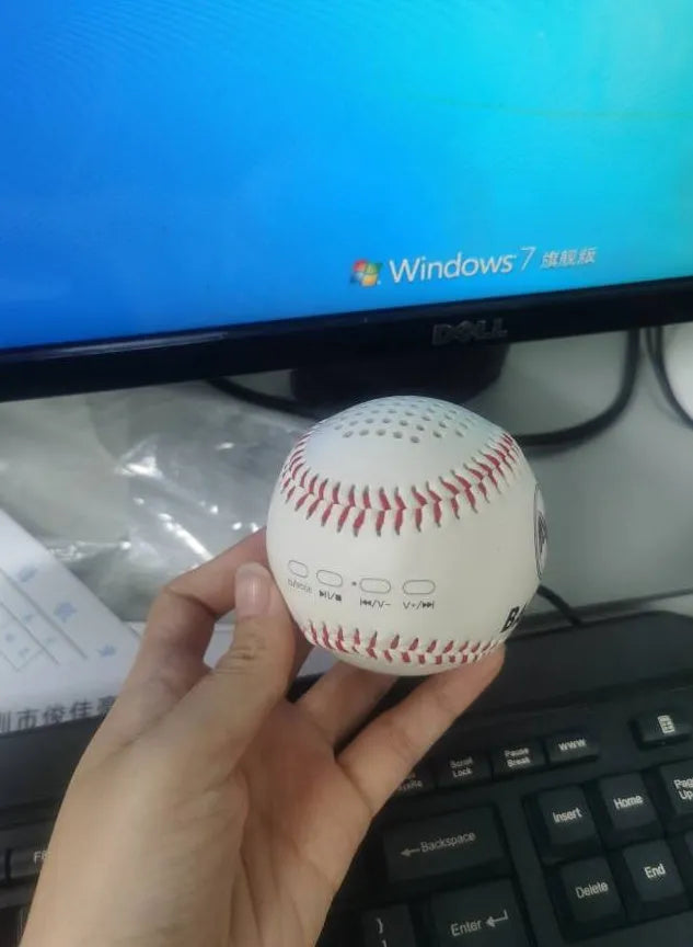 Baseball-styled Bluetooth wireless speaker in green colour with USB charging port