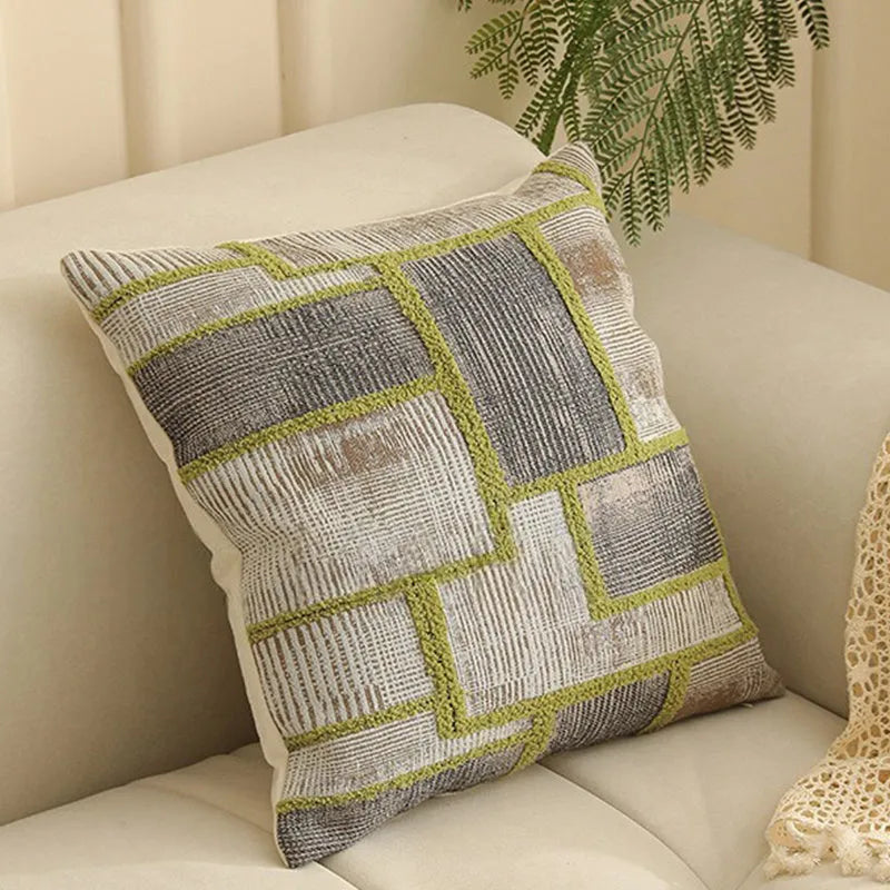 Close-up of a textured jacquard floral pillow cover in a 45cm square size, showcasing yarn-dyed pattern details.