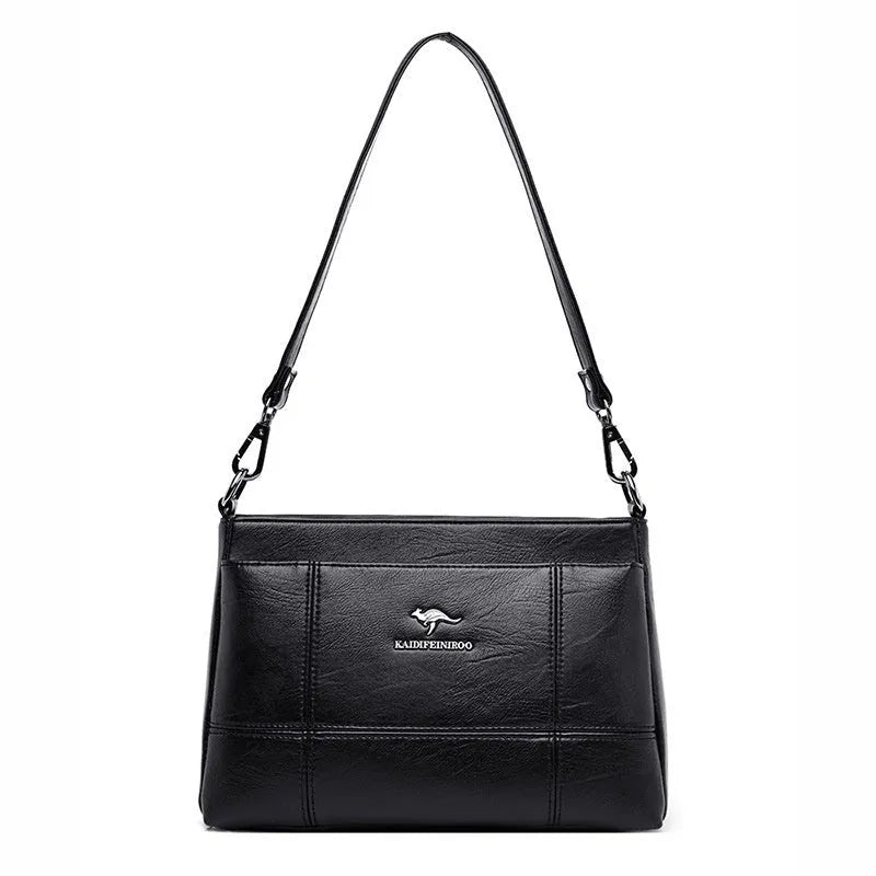 Small square sheepskin shoulder messenger bag with soft handle and double strap in solid colour