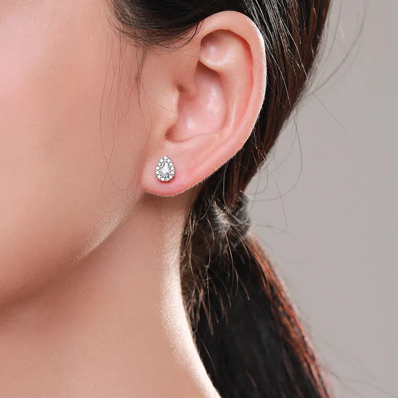 Women's silver water drop ear studs made from 925 sterling silver.