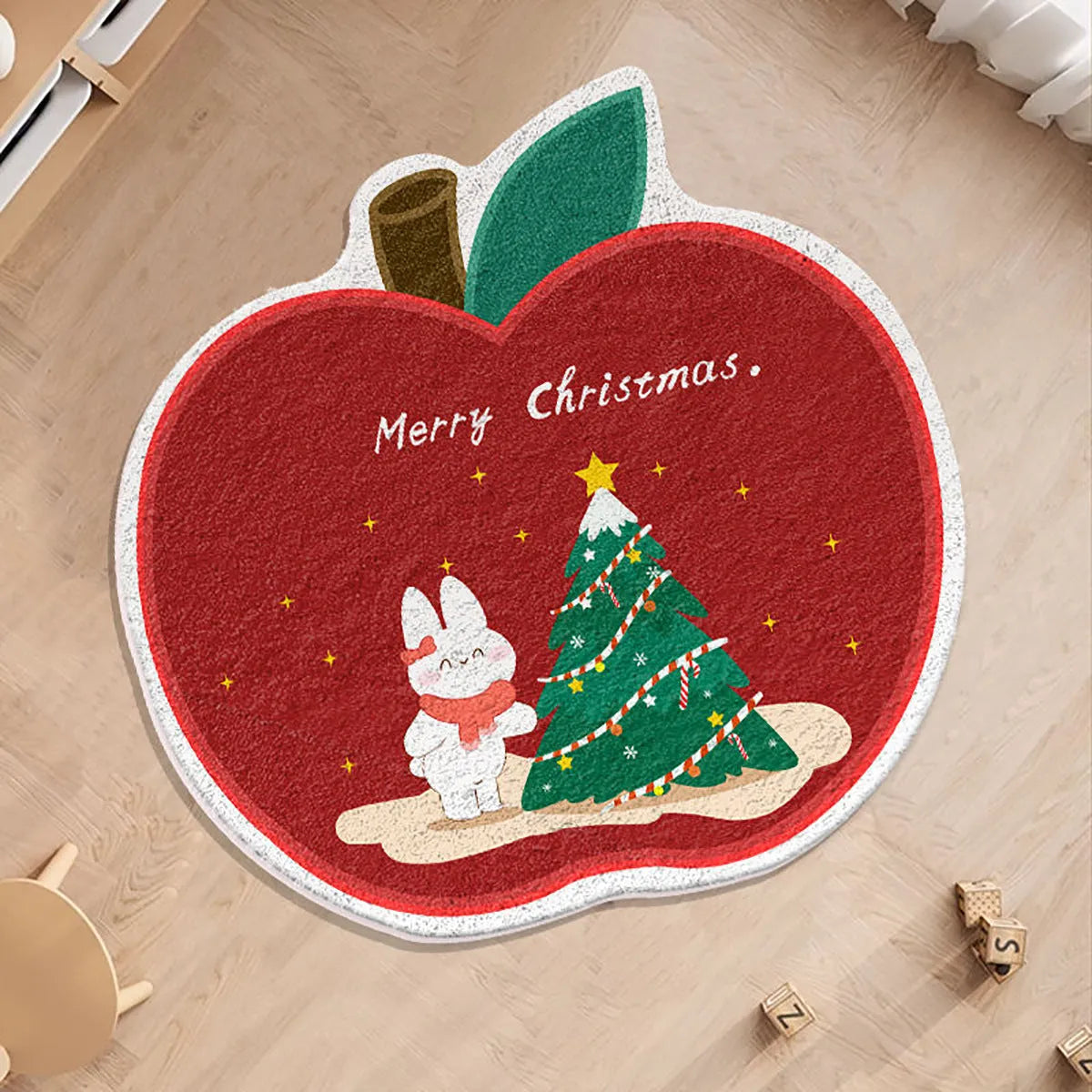 A round alien-shaped Christmas floor mat in imitation cashmere, shown in a festive colour pattern.