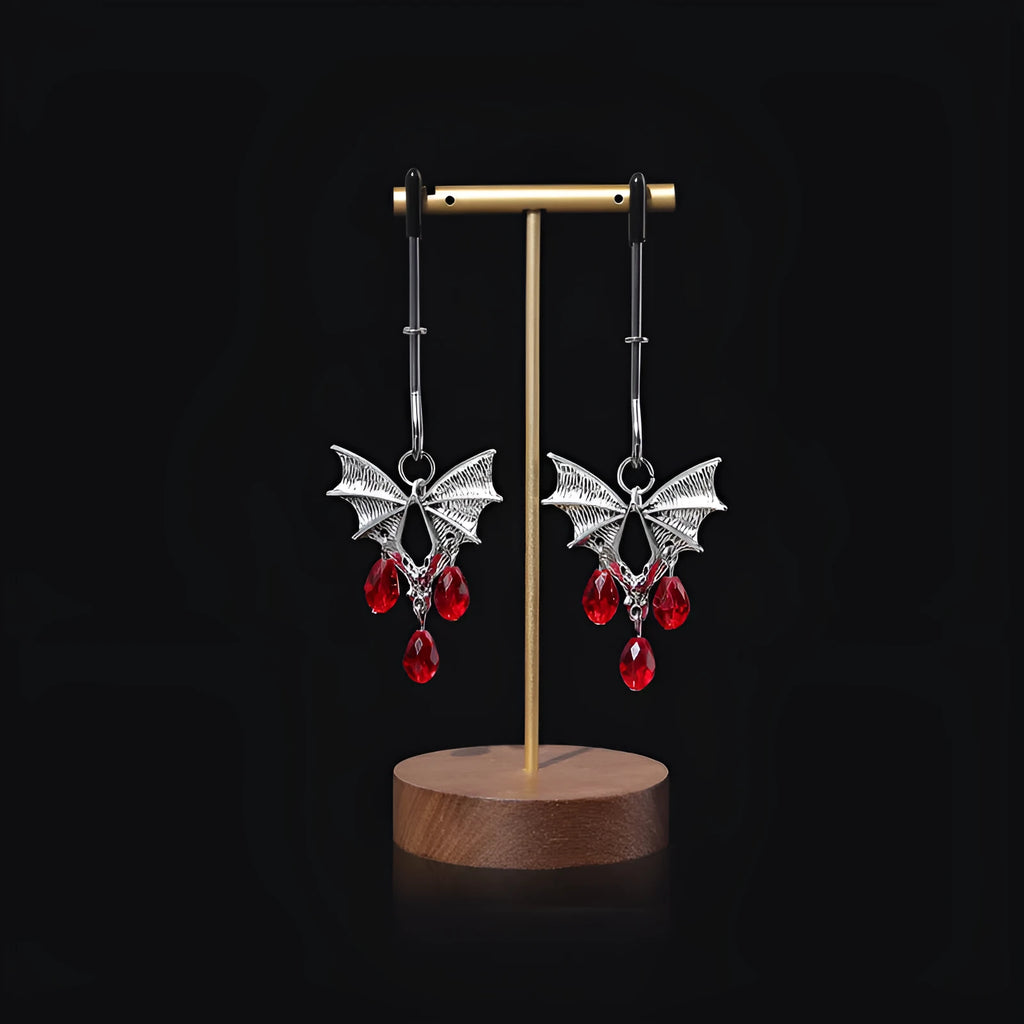 Silver bat nipple clamp with adjustable mechanism and ruby bat clip design