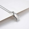 Curved peach heart silver necklace with stainless steel chain and adjustable extension