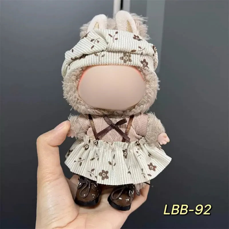 Plastic doll costume for a 17cm tall vinyl figurine on a white background.