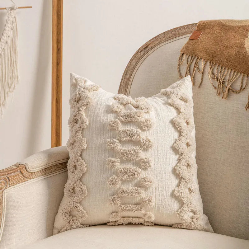 Knitted decorative cushion cover with tassel fringe in spiral dots pattern showing 45x45cm size