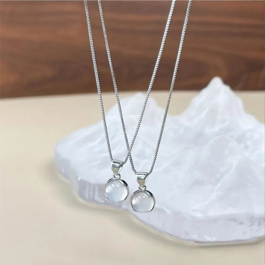 Women's Korean-style oval artificial crystal star pendant necklace on an adjustable box chain.