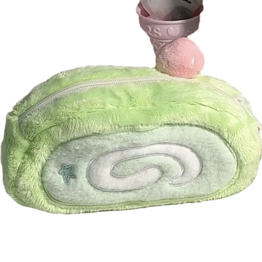 A plush velvet pencil case designed like a Swiss roll cake, in a Korean style.