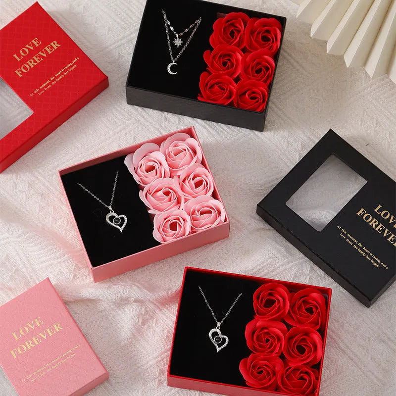 Six red soap roses in a black gift box with a matching handbag, a Korean style Valentine's gift set.