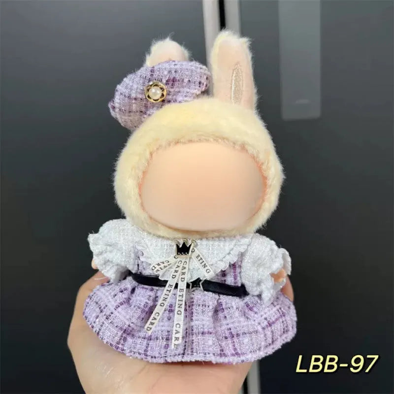 Plastic doll costume for a 17cm tall vinyl figurine on a white background.