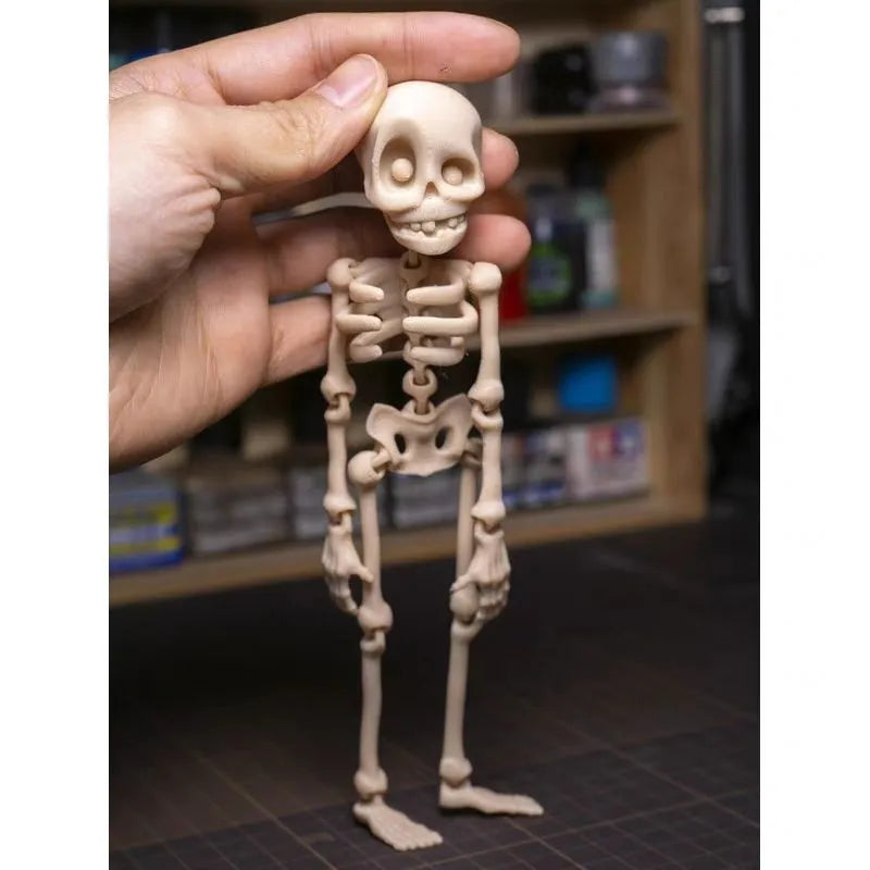 3D printed white skull refrigerator magnet ornament showing detailed modelling, 18cm tall.