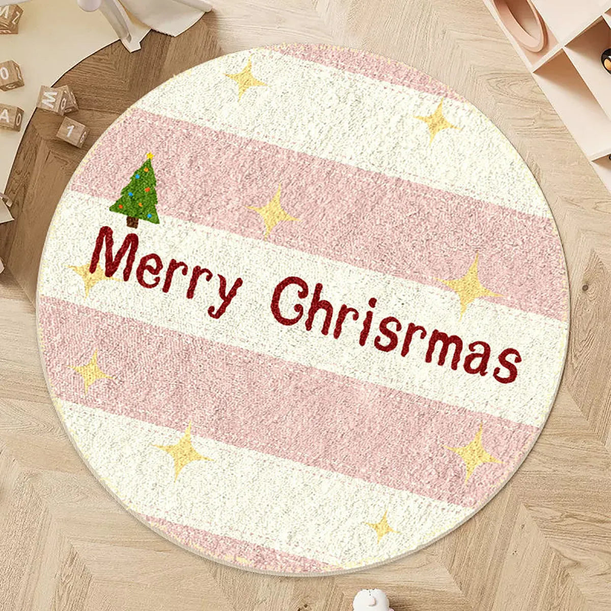 A round alien-shaped Christmas floor mat in imitation cashmere, shown in a festive colour pattern.