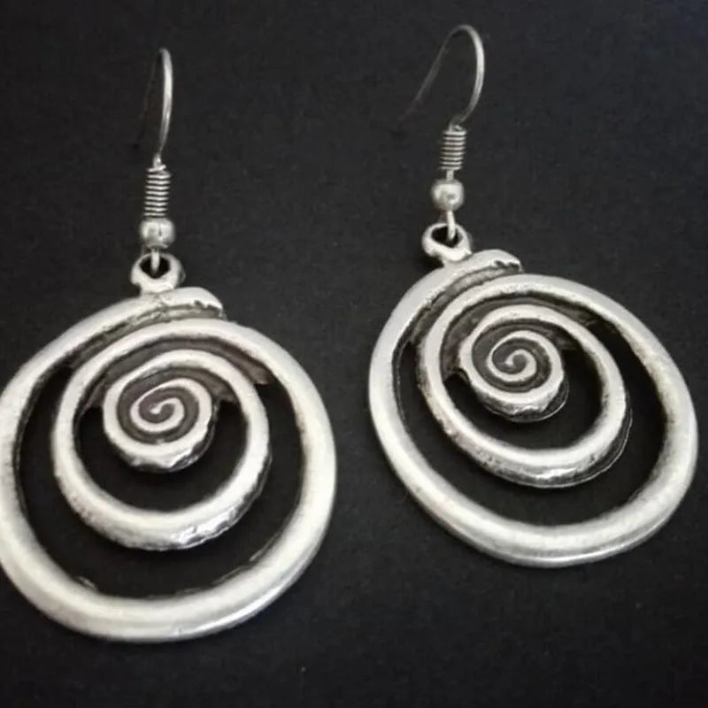 Retro geometric spiral distressed silver alloy earrings measuring 2.6cm by 5cm