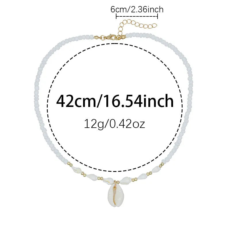 White electroplated shell necklace with conch bead mother-of-pearl pendant on a regular chain.